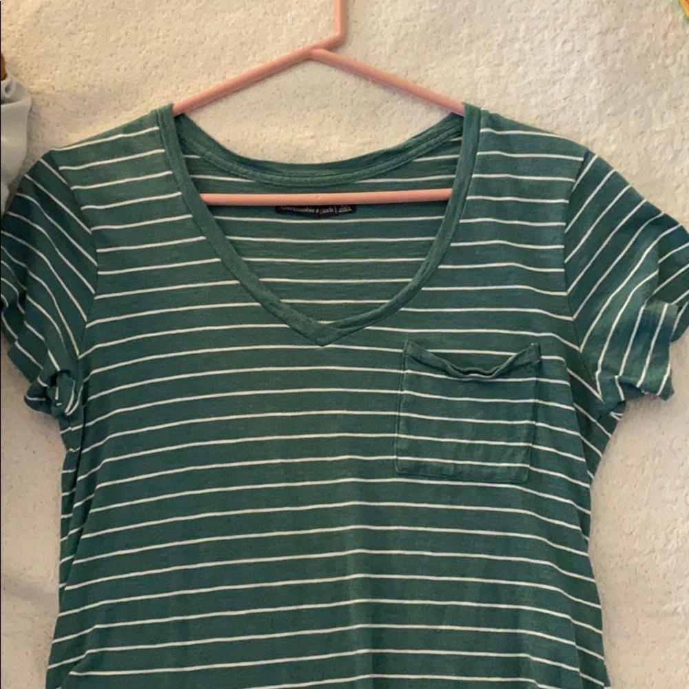 green and white striped v neck top